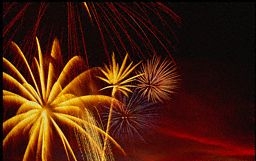 Fireworks in the dimming evening sky