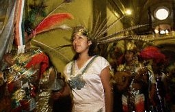 Celebrants entering the church in traditional costume